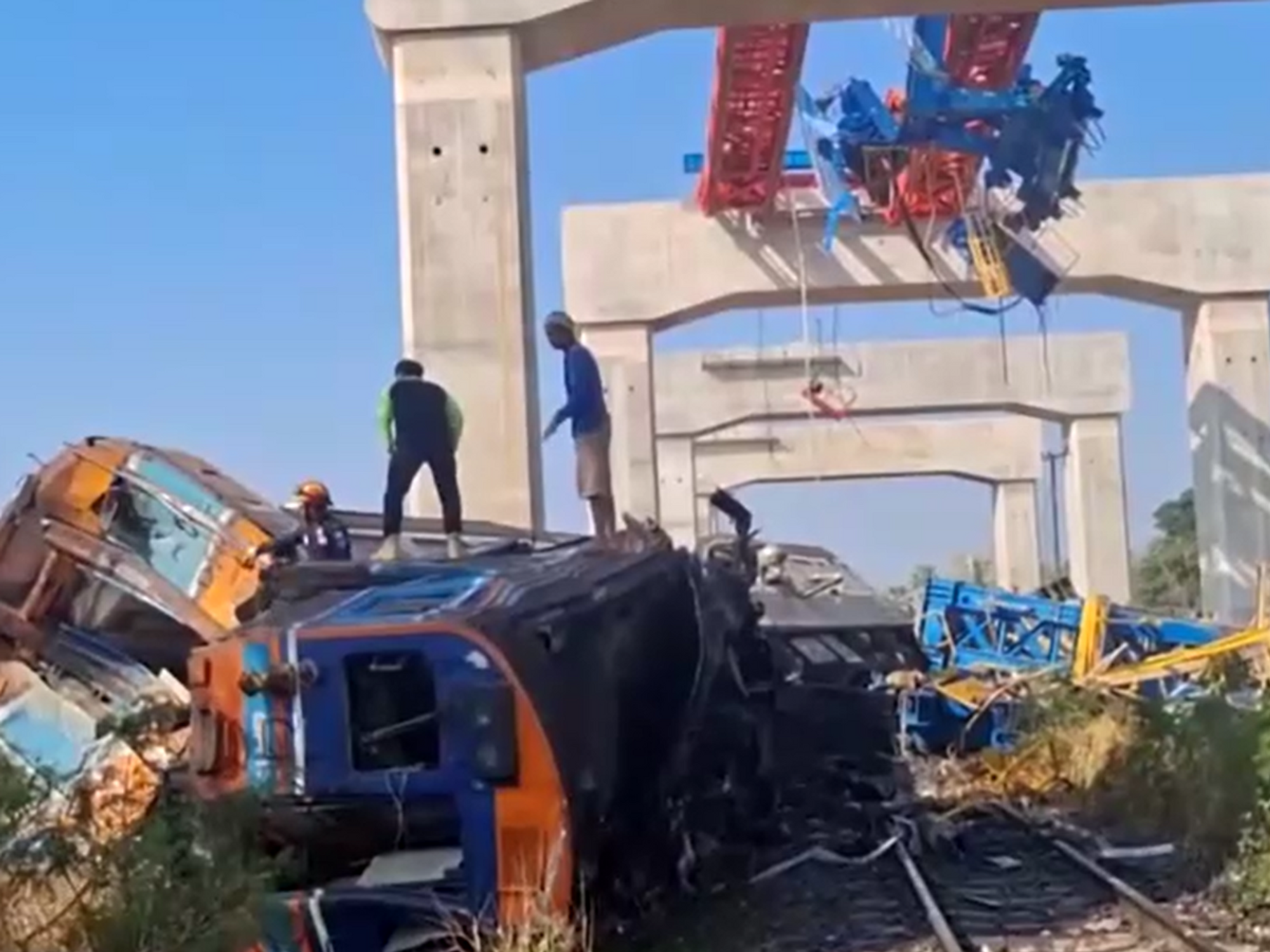 More than 22 dead and at least 80 injured after crane COLLAPSES onto train in Thailand