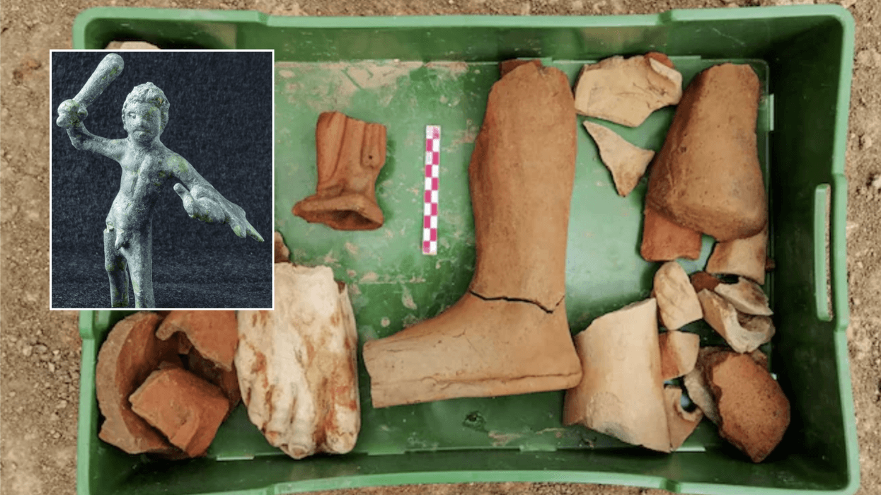 Archaeologists uncover sacred Roman shrine buried in mud containing six statues of legendary Greek hero