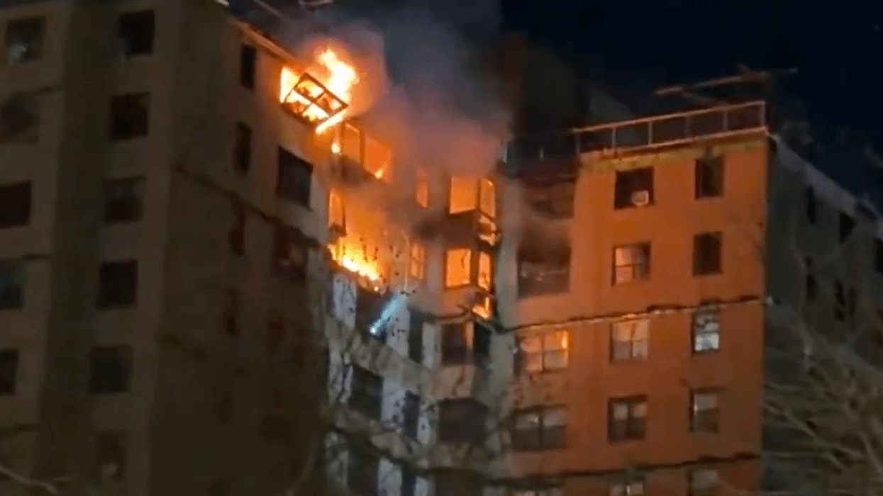 New York fire: Emergency crews rush to huge blaze engulfing upper floors of high-rise