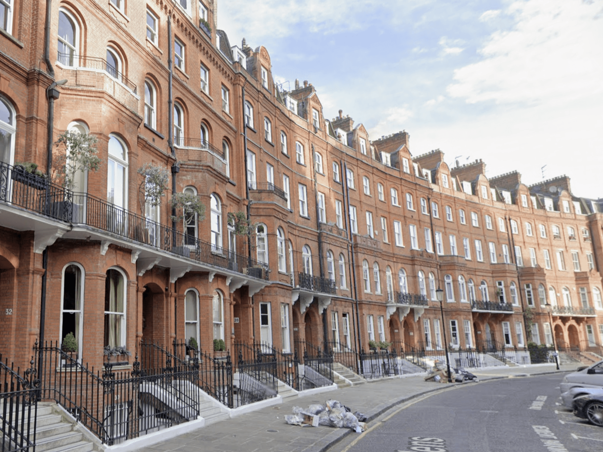 Former Goldman Sachs banker sued for £100k by her neighbours over leaky shower