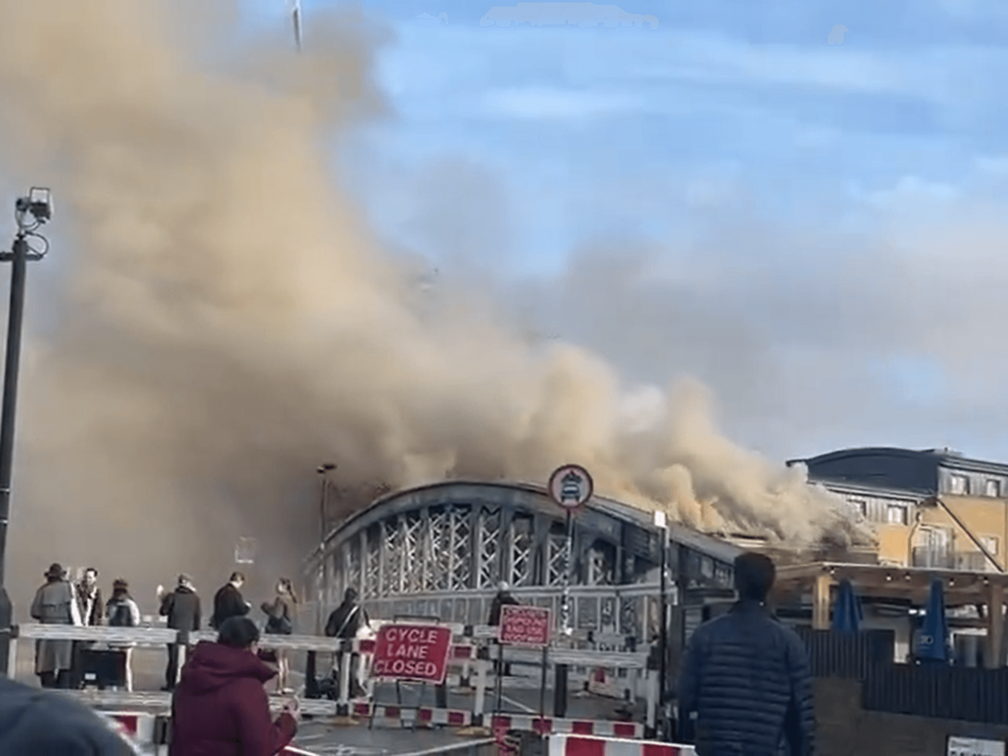 Travel chaos engulfs London as huge fire erupts near Euston station and smoke billows over Capital