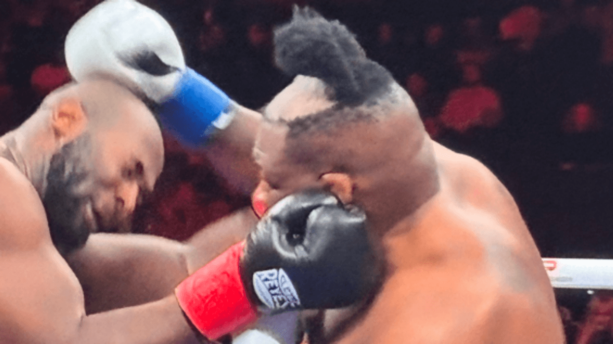 Boxing star has wig PUNCHED OFF his head as remarkable footage goes viral