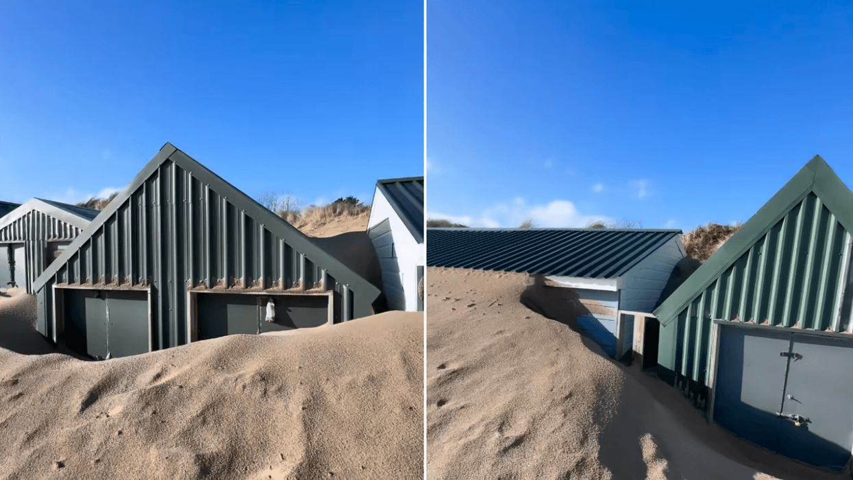 Beach huts on one of Britain's most exclusive holiday hotpots buried under huge mountains of sand