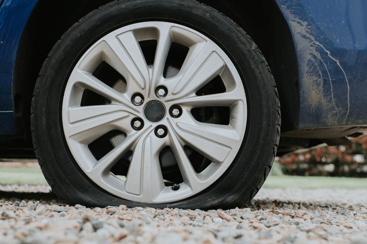 Neighbour row erupts as driver damages his car after reversing onto homeowner's driveway