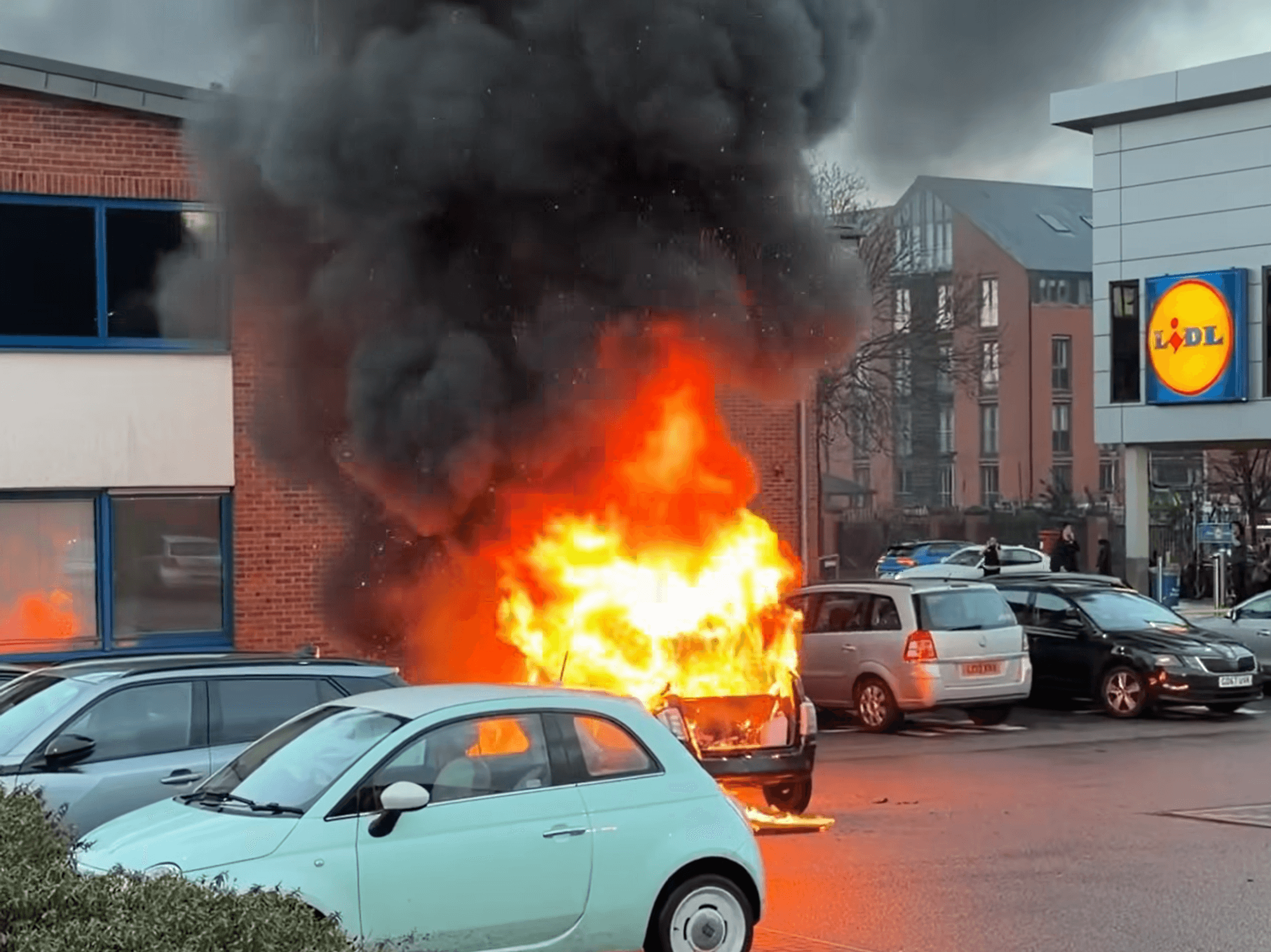 Lidl car park engulfed in flames after vehicle erupts into raging inferno