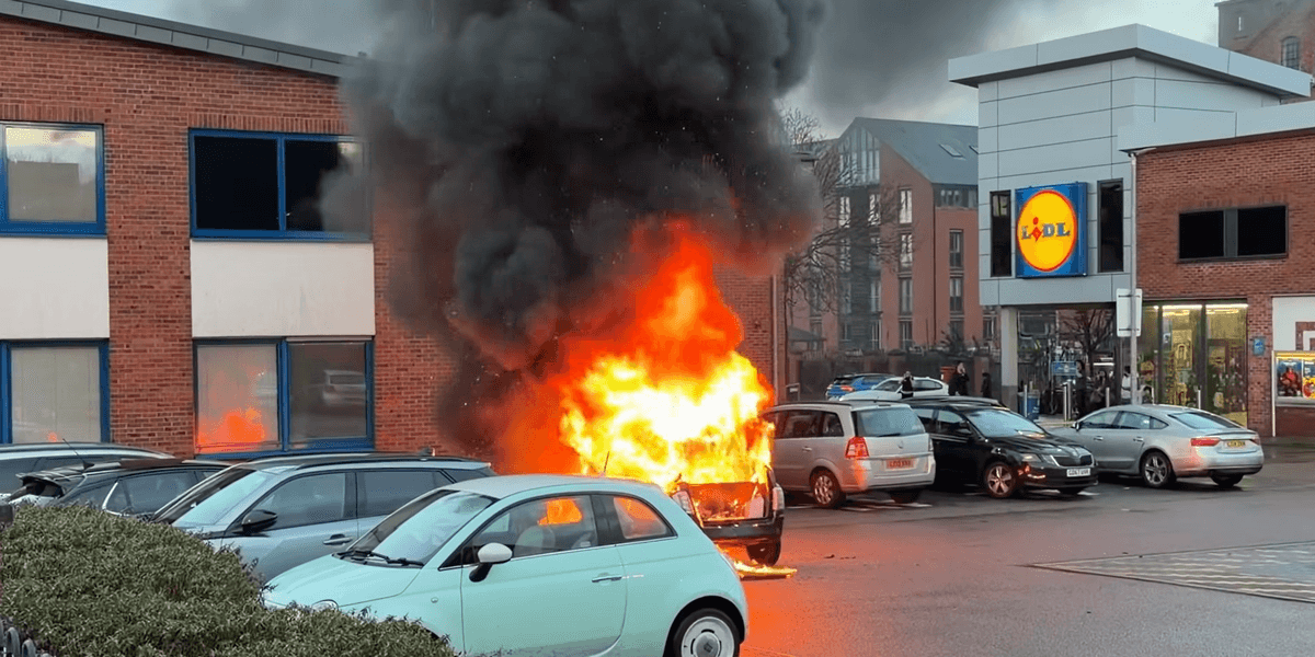 Lidl car park engulfed in flames after vehicle erupts into raging inferno Lidl car park engulfed in flames after vehicle erupts into raging inferno