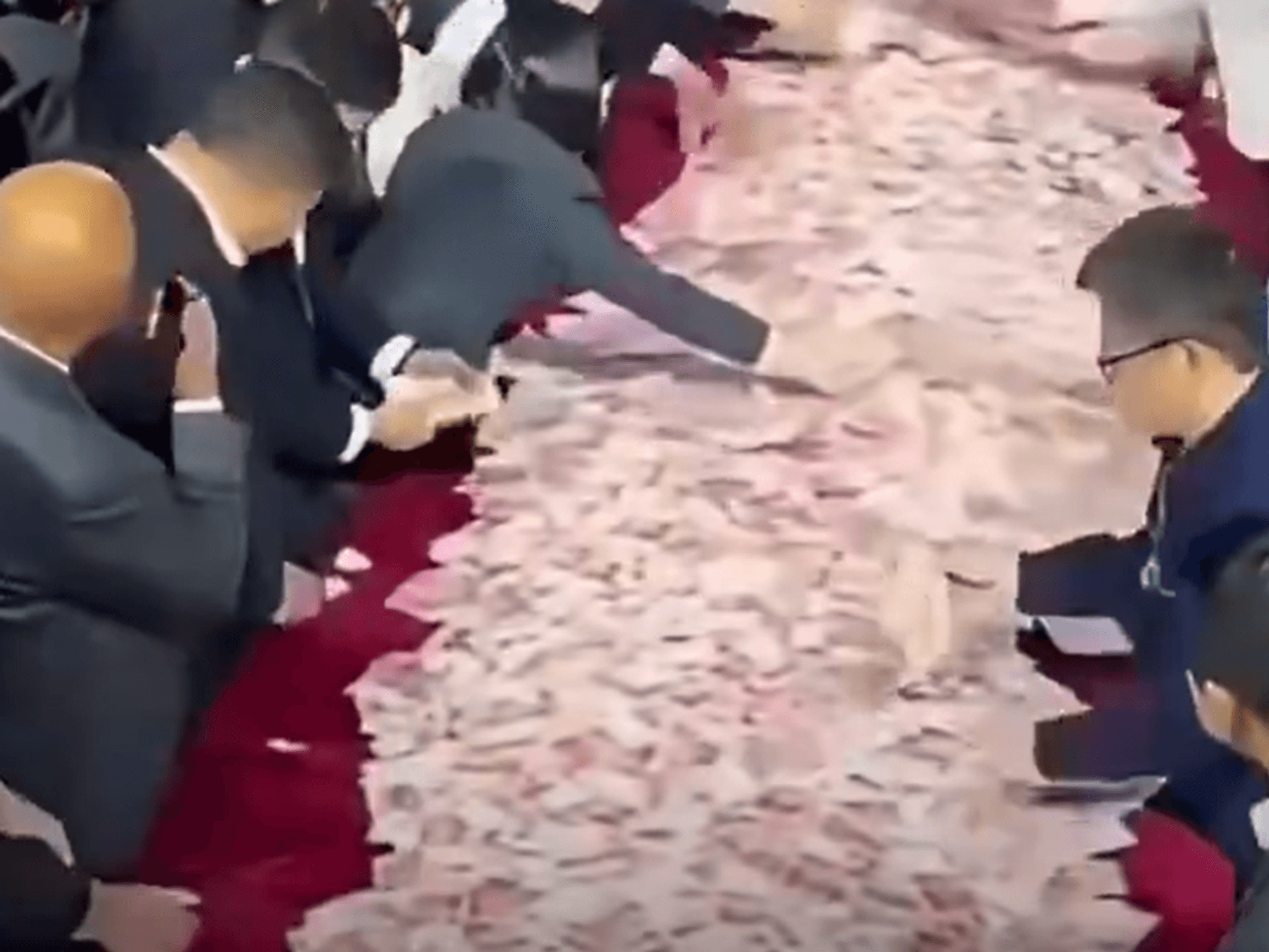 Chinese company lays out £19MILLION in cash bonus at end of year party for employees