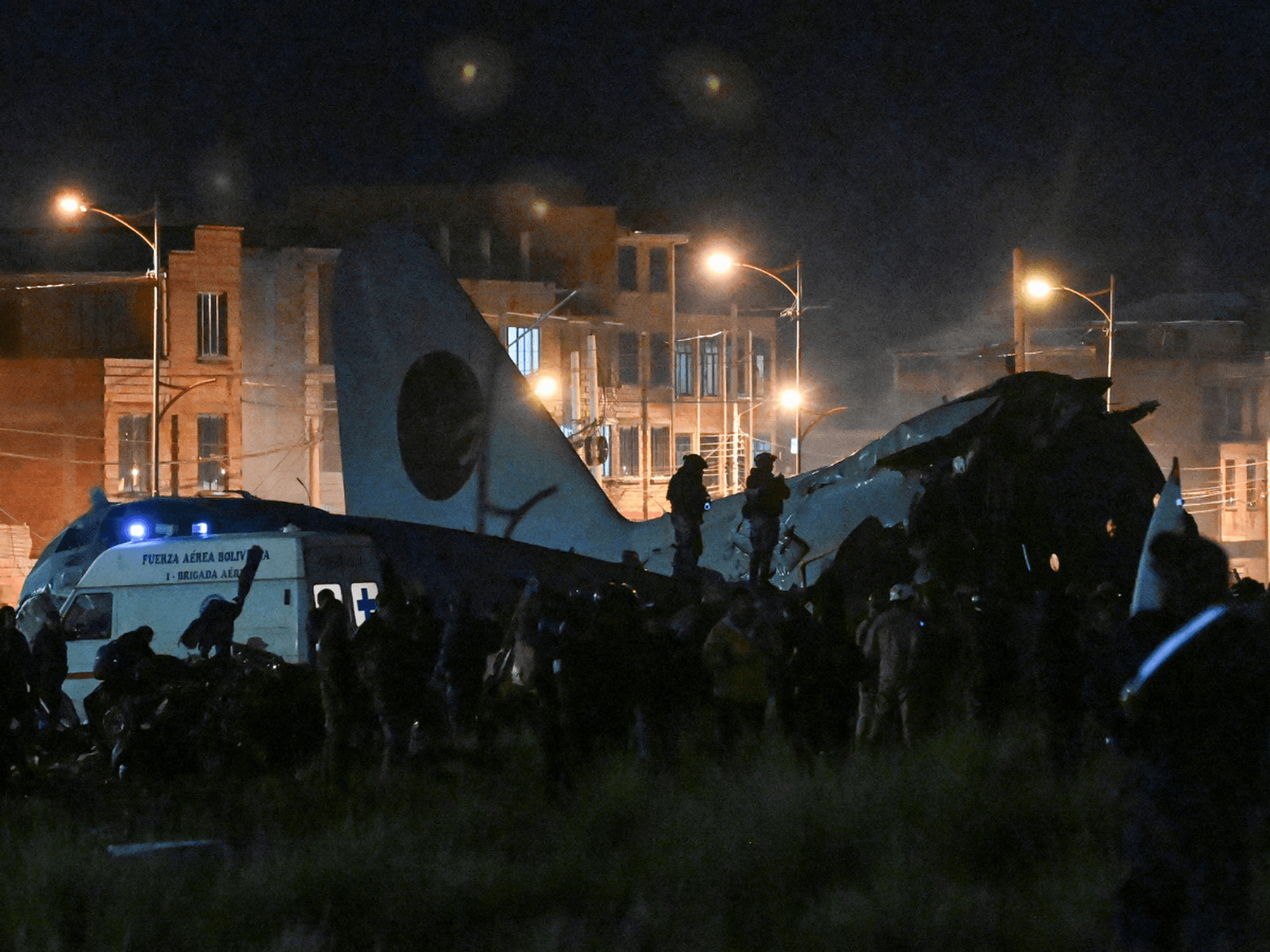 At least 15 dead after plane packed with banknotes crashes onto motorway in Bolivia