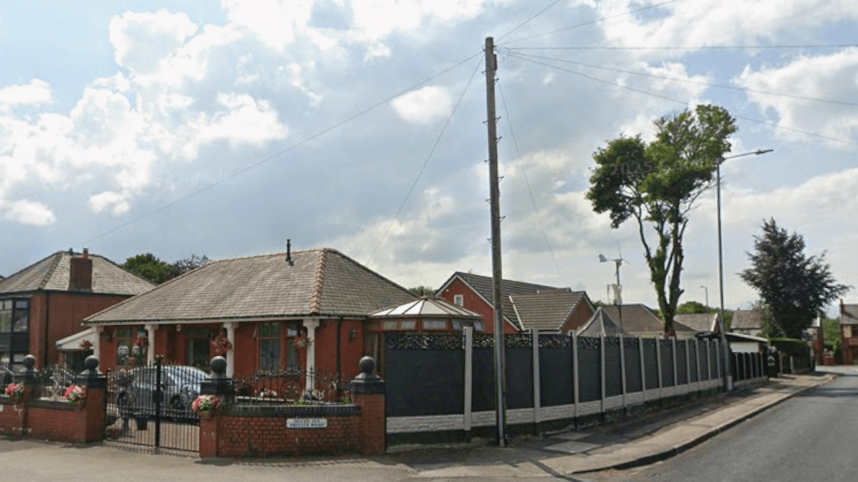 Penionsers forced to tear down £4,500 fence after neighbours complained it was 'intrusive of area’s character'