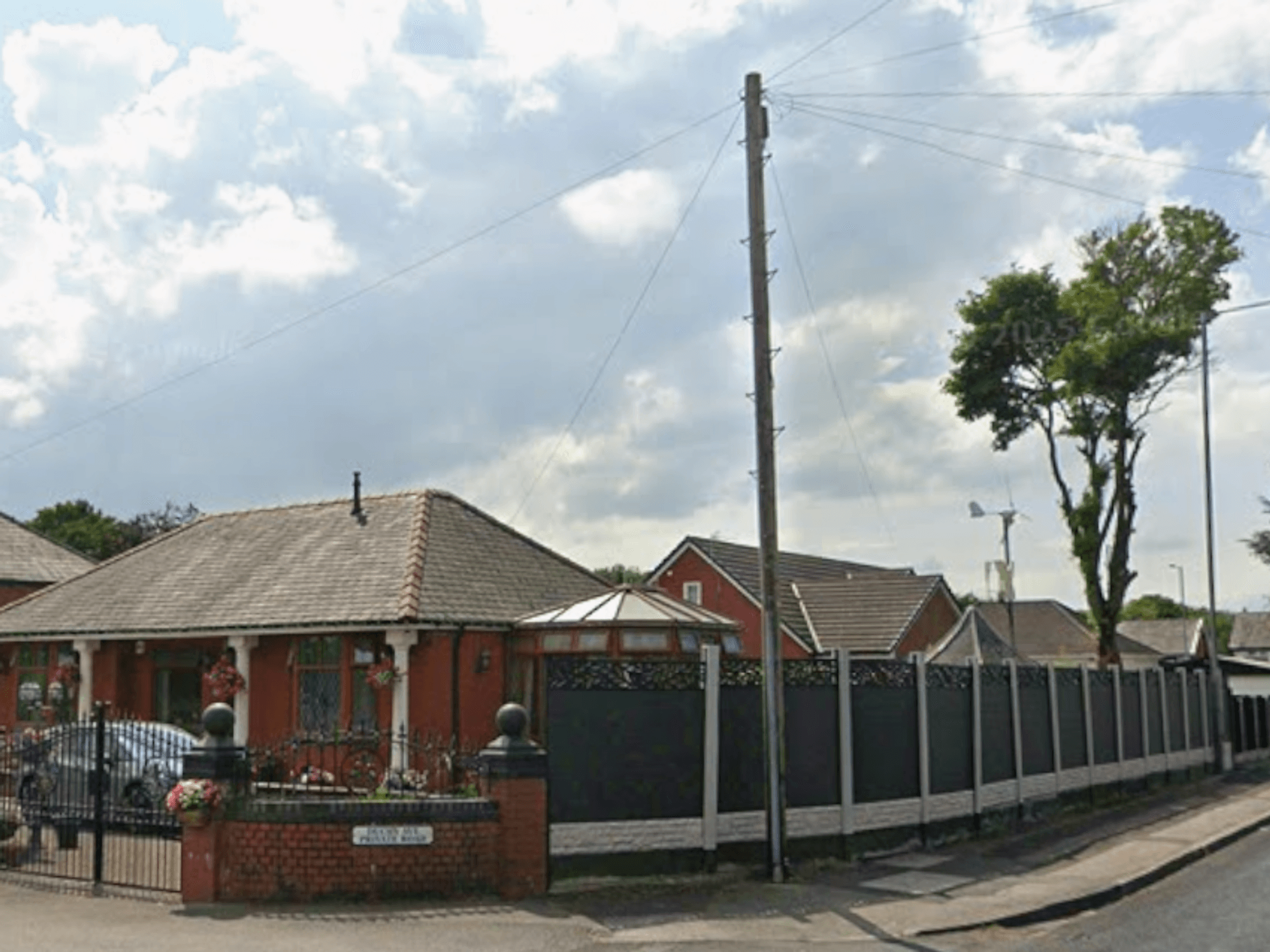 Penionsers forced to tear down £4,500 fence after neighbours complained it was 'intrusive of area...