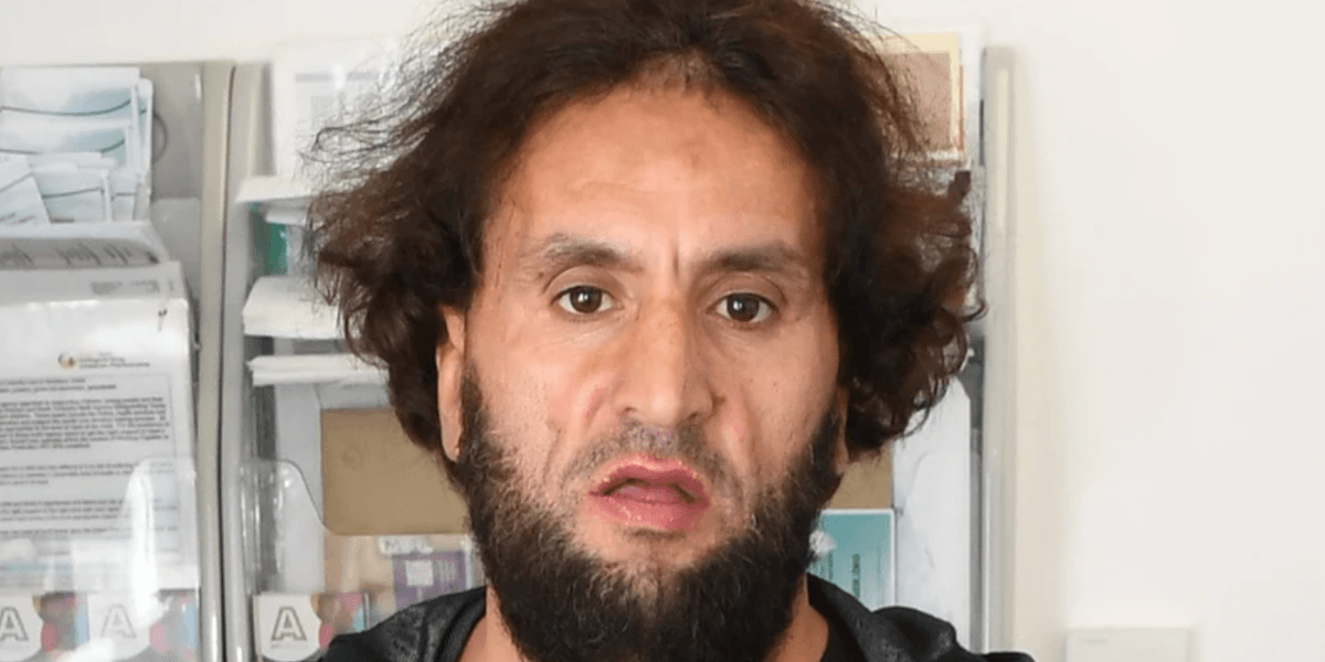 Moroccan asylum seeker who killed pensioner charged with attempted murder and assault of prison officers Moroccan asylum seeker who killed pensioner charged with attempted murder and assault of prison officers