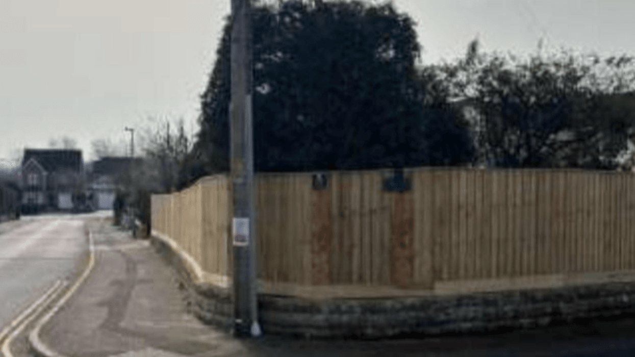 Planning row erupts over six-foot fence built without permission as homeowner cries 'jealousy'
