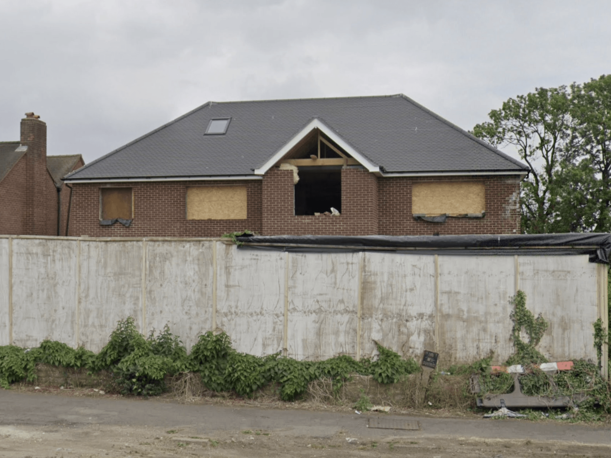 Neighbour row erupts over newbuild six-bed mansion after homeowner ordered to demolish it TWICE
