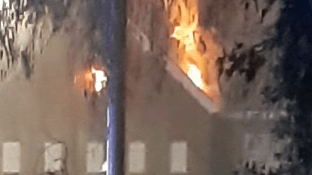 Huge fire engulfs Suffolk railway with all trains cancelled as smoke billows through the night sky