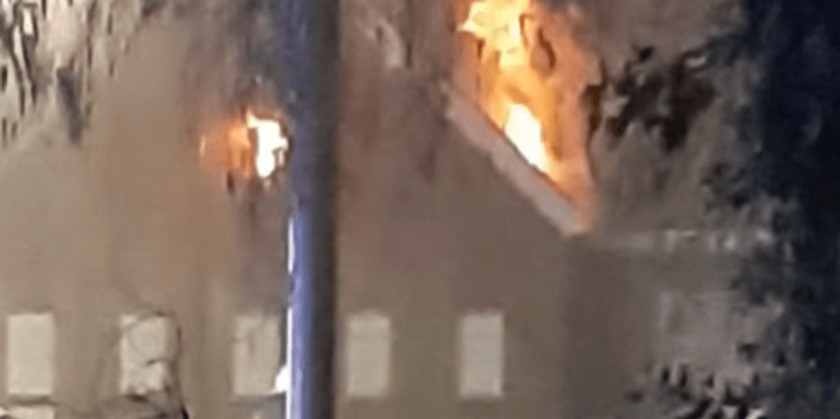 Huge inferno engulfs railway with all trains cancelled as smoke billows through the night sky Huge inferno engulfs railway with all trains cancelled as smoke billows through the night sky