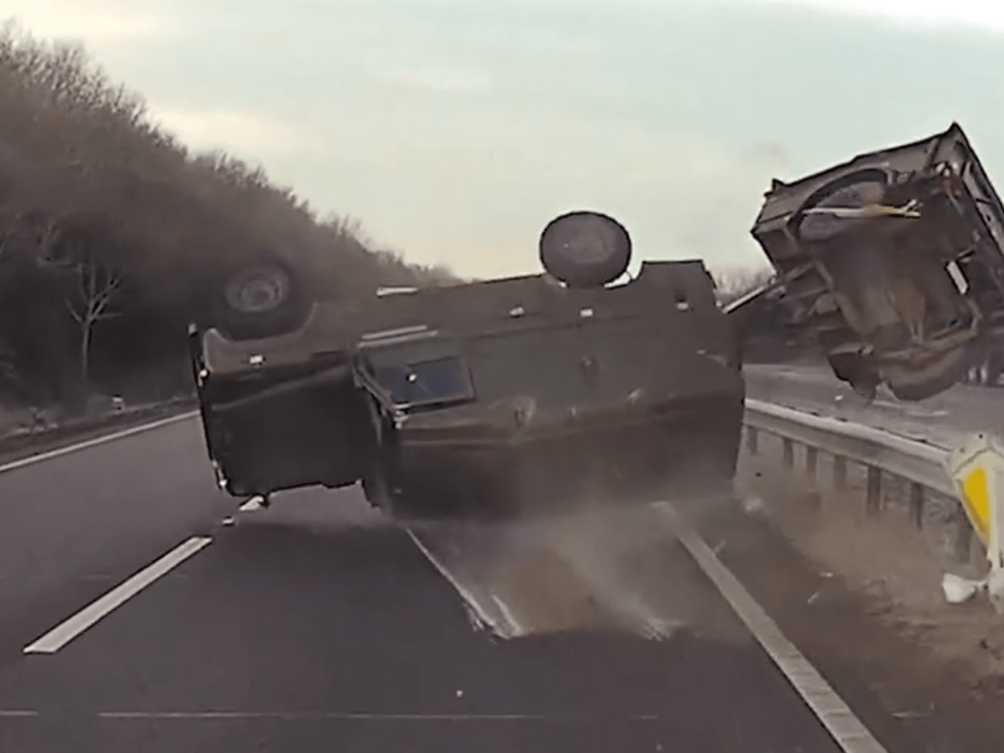 Two soldiers injured after military Land Rover and trailer flips over dual carriageway in horror crash