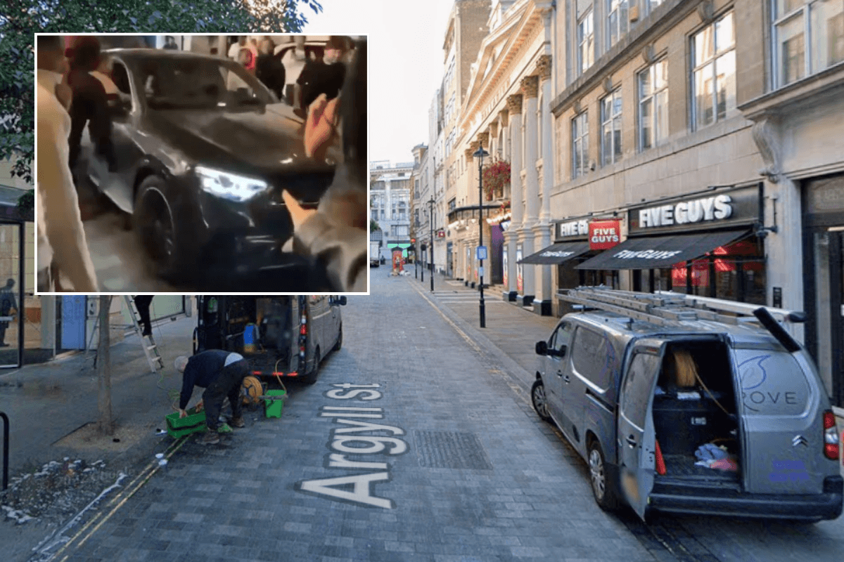Three people injured after car ploughs into central London crowds as police arrest woman