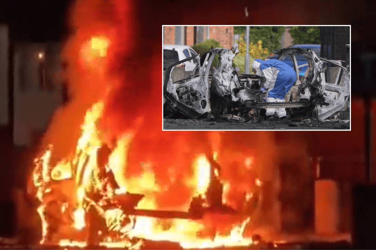 Car bomb explodes outside Belfast police station in suspected 'New IRA' attack