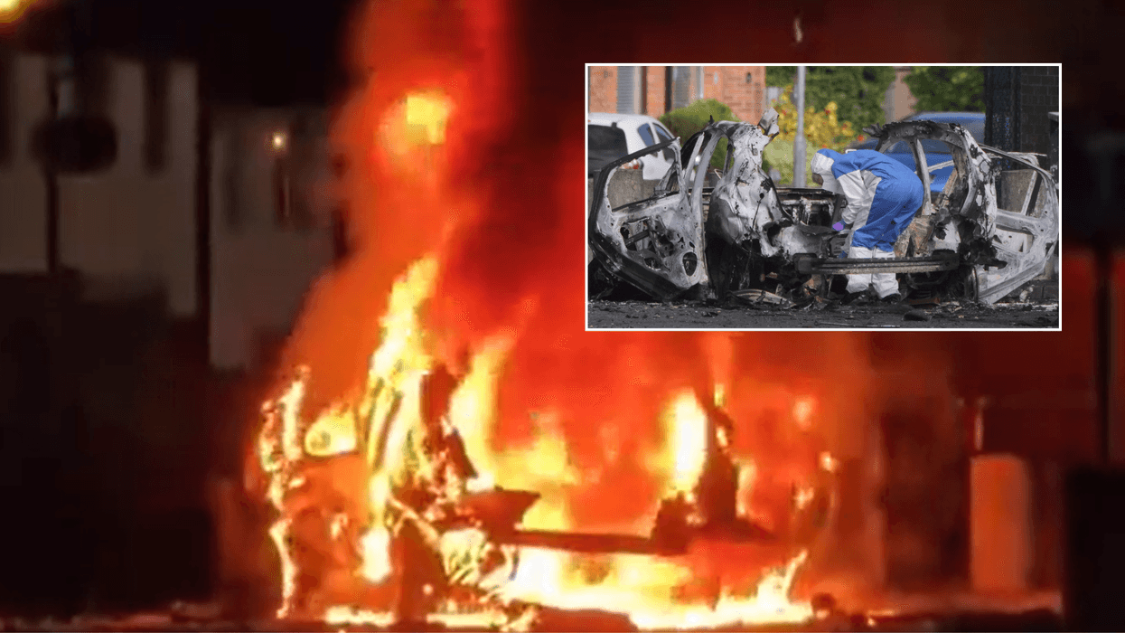 Car bomb explodes outside Belfast police station in suspected 'New IRA' attack