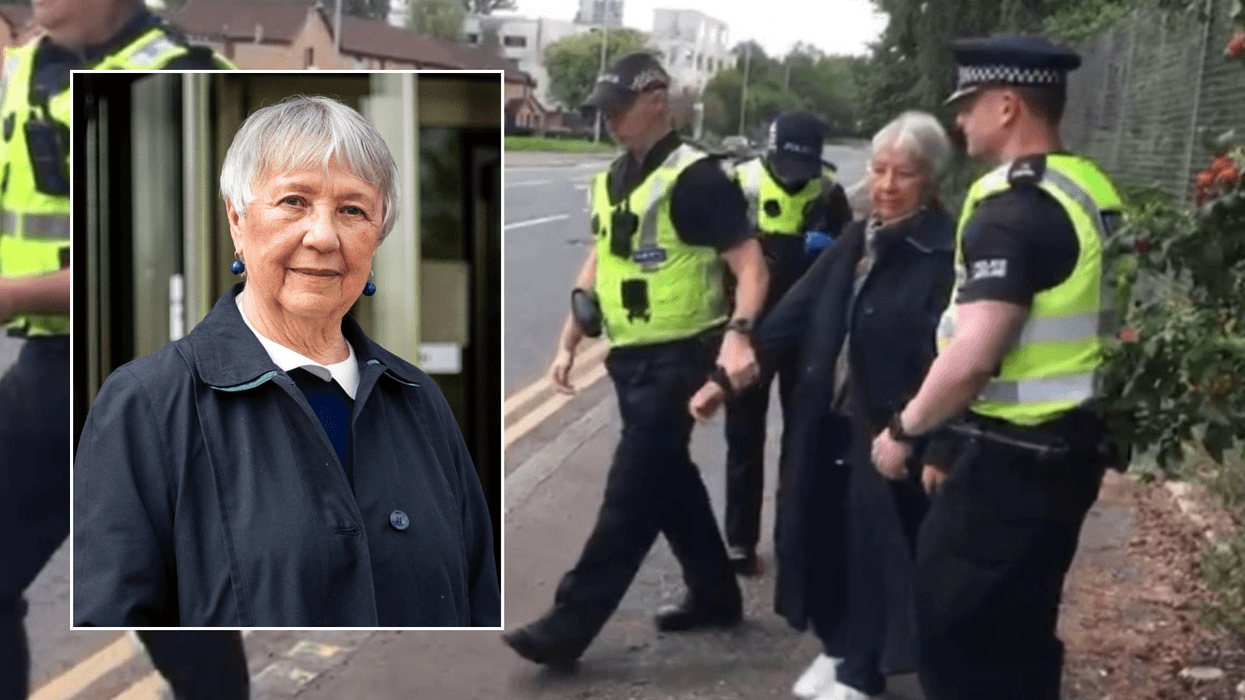 Free speech victory as Scottish grandmother cleared for holding 'here to talk' placard outside abortion clinic