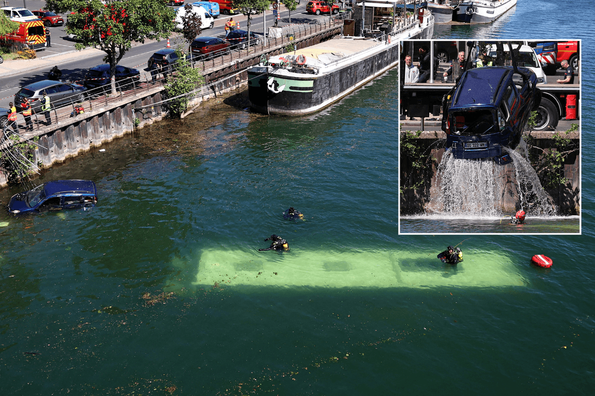Bus plunges into River Seine in Paris after trainee driver collided with car as search underway for passenger