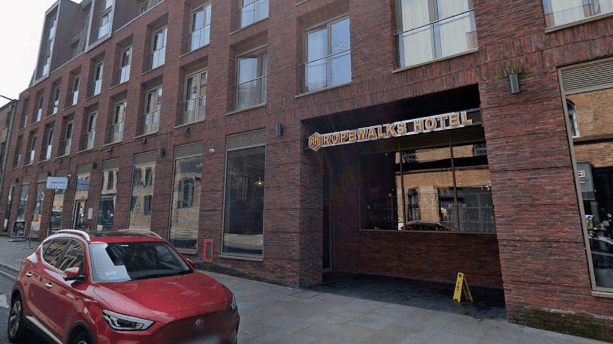 Knifeman arrested after four-hour standoff with armed police 'making threats to kill' at city hotel