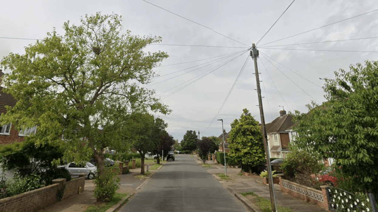 Man shot dead by armed police after 'barricading himself' inside house on leafy British street