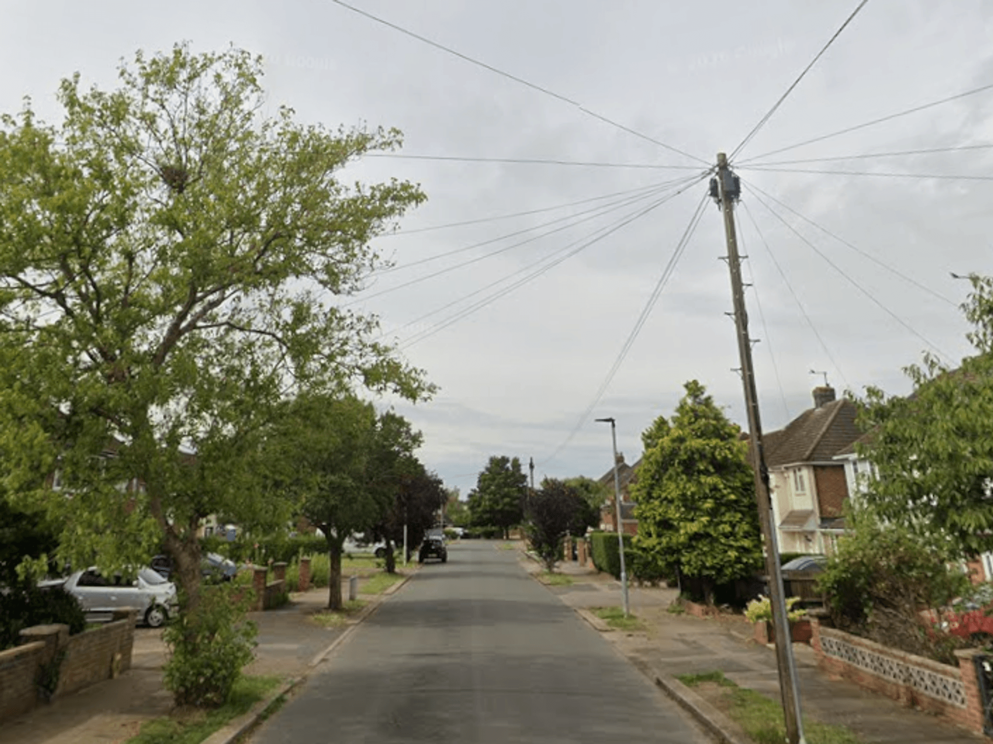 Man shot dead by armed police after 'barricading himself' inside house on leafy British street