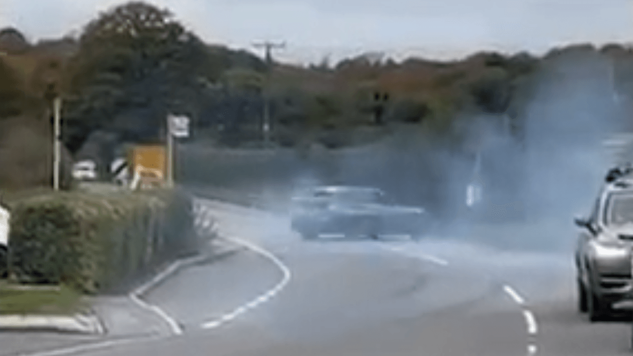 Watch the moment BMW driver crashes into hedge ...