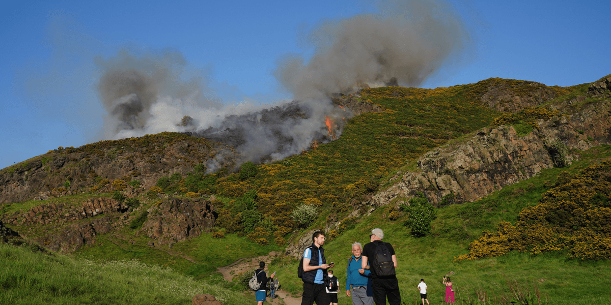 Hikers flee iconic British landmark as emergency services tackle huge wildfire Hikers flee iconic British landmark as emergency services tackle huge wildfire