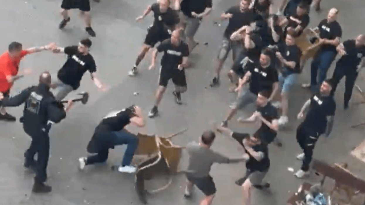 Crystal Palace fans ambushed by black-clad mob in Leipzig on eve of Conference League final