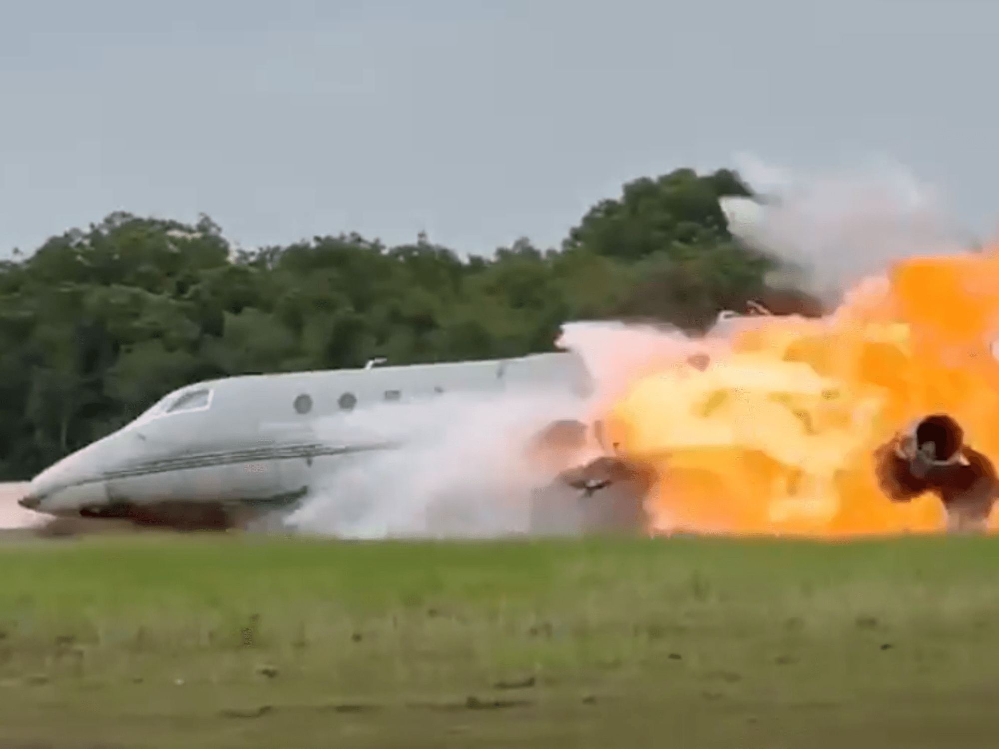 Two dead after private jet erupts into massive fireb
a
ll skidding across runway
