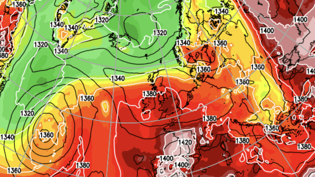 Britons braving rain until end of the week as signs emerge of sizzling return to summer