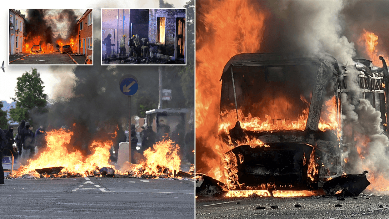 Belfast burns and fury boils over in Northern Ireland as thousands protest after 'migrant knife attack'