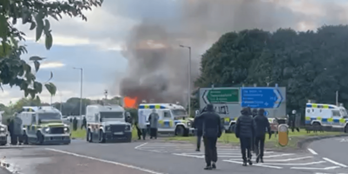 Explosion in Belfast as masked protesters hurl objects at police on second night of violence