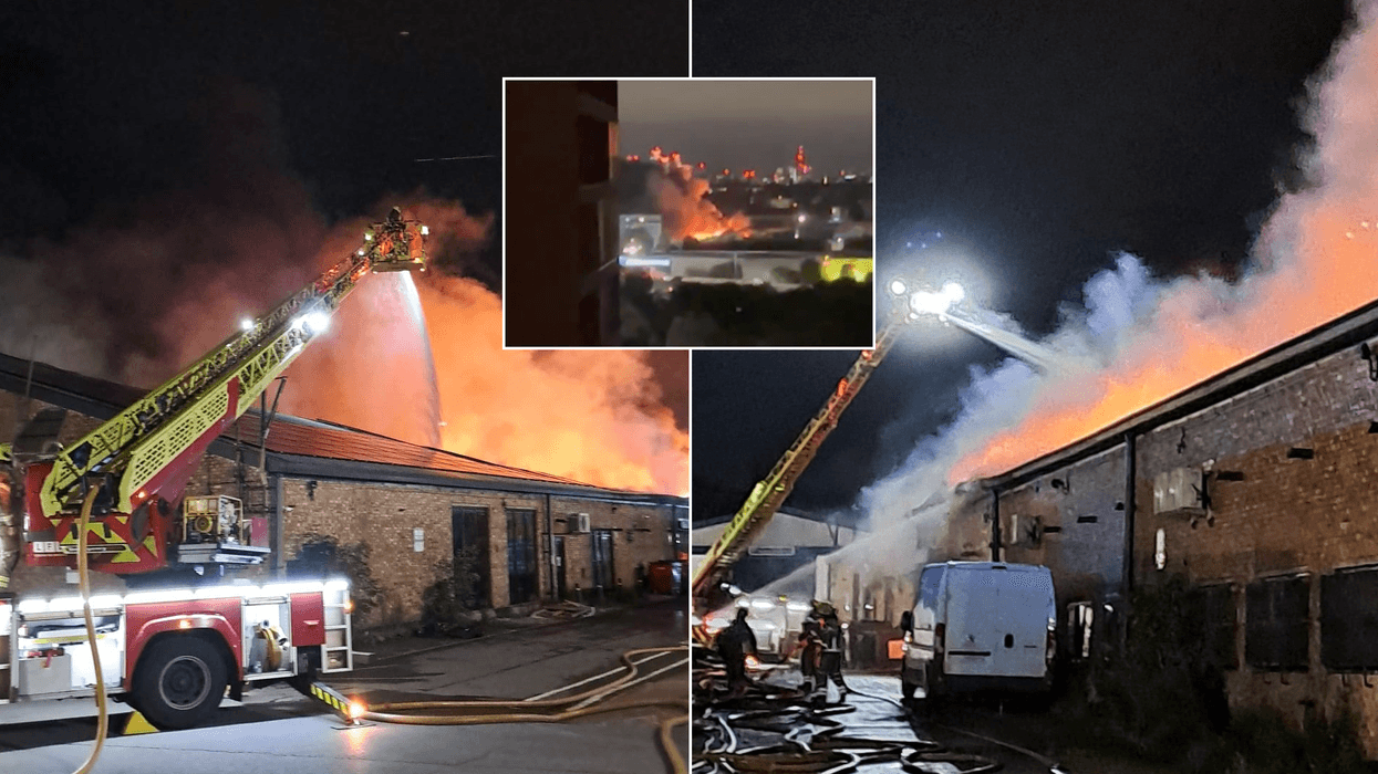 Nearly 100 people evacuated as huge late-night fire rips through estate in London