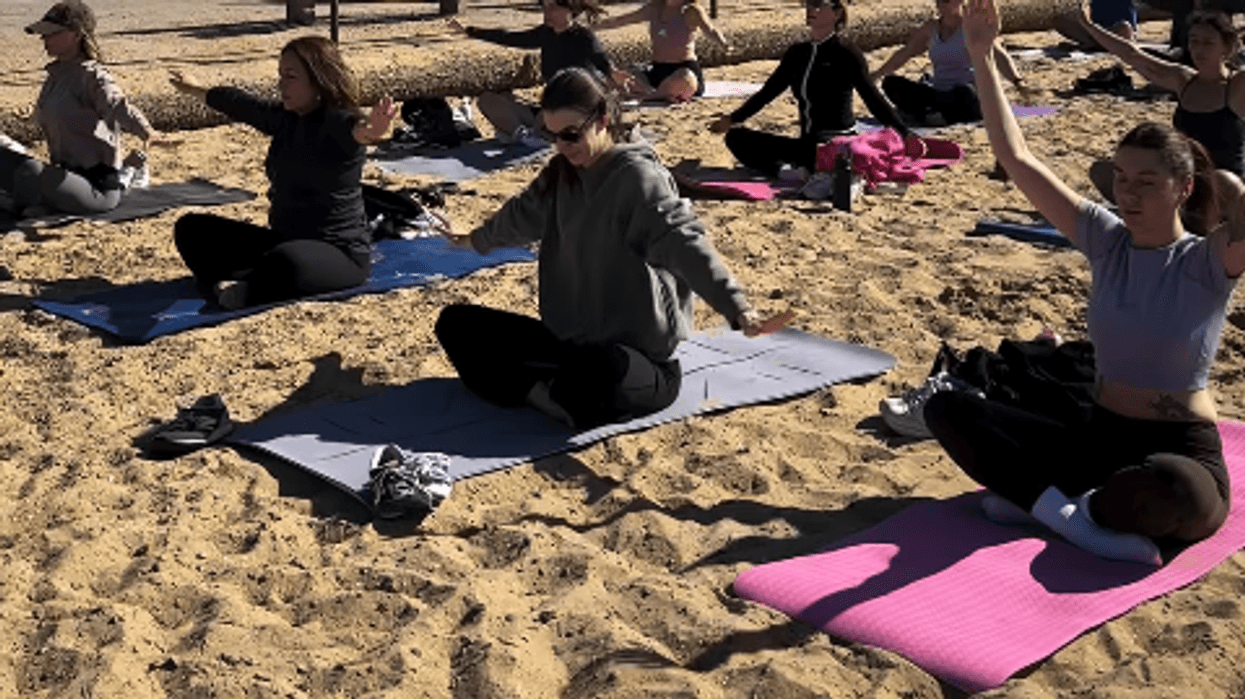 Council causes 'frustration' after Pilates class forced to moved from beach to small cafe