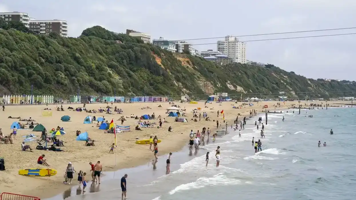 Mysterious 'encampment' appears on popular South Coast beach just yards from migrant hotel