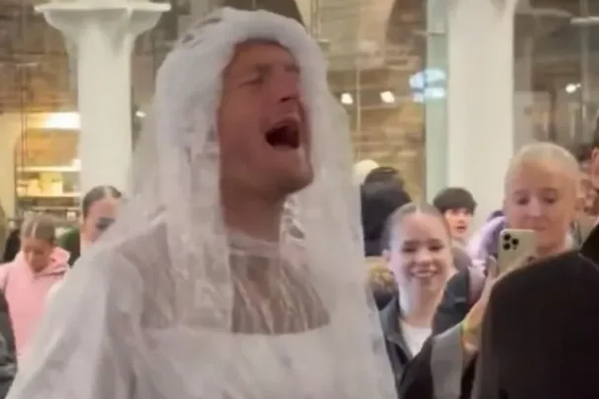 English Premier League footballer seen singing in a wedding dress just hours after defeat