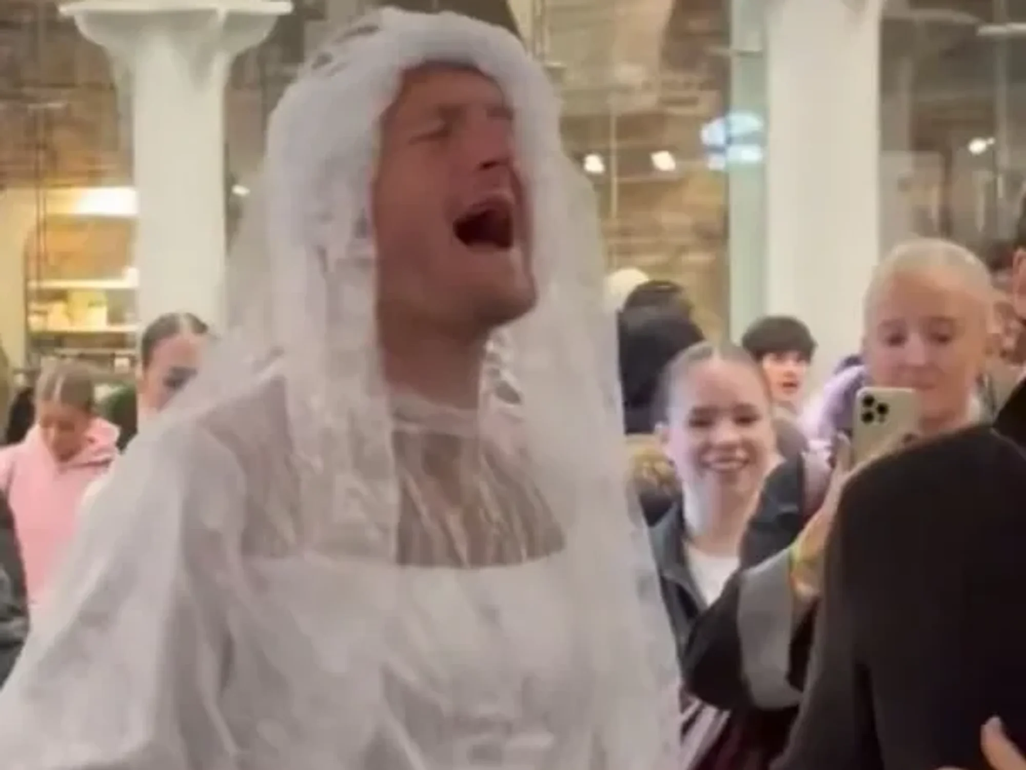 English Premier League footballer seen singing in a wedding dress just hours after defeat