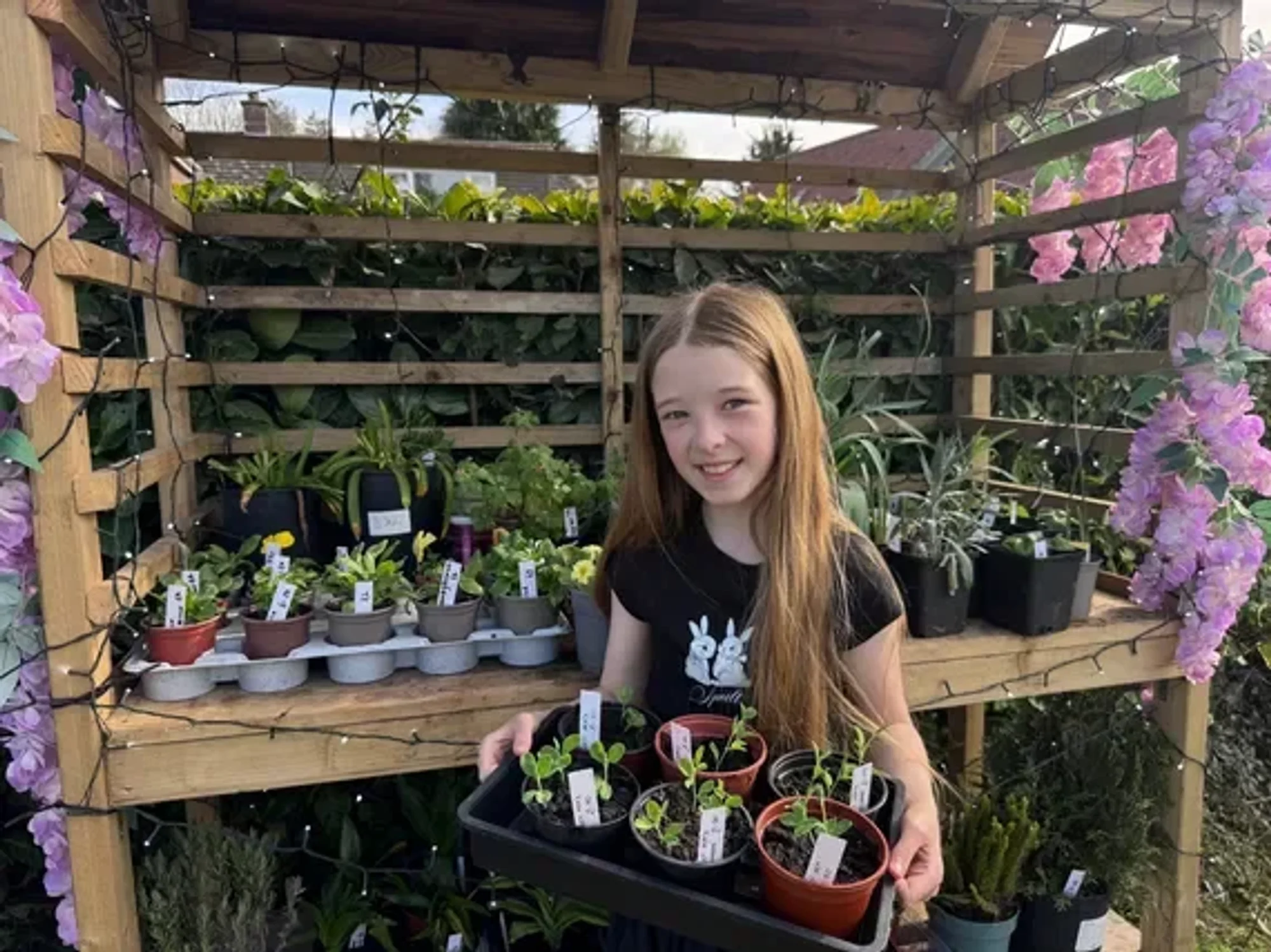 Girl, 9, fundraises £24,000 for charity selling plants in memory of grandfather