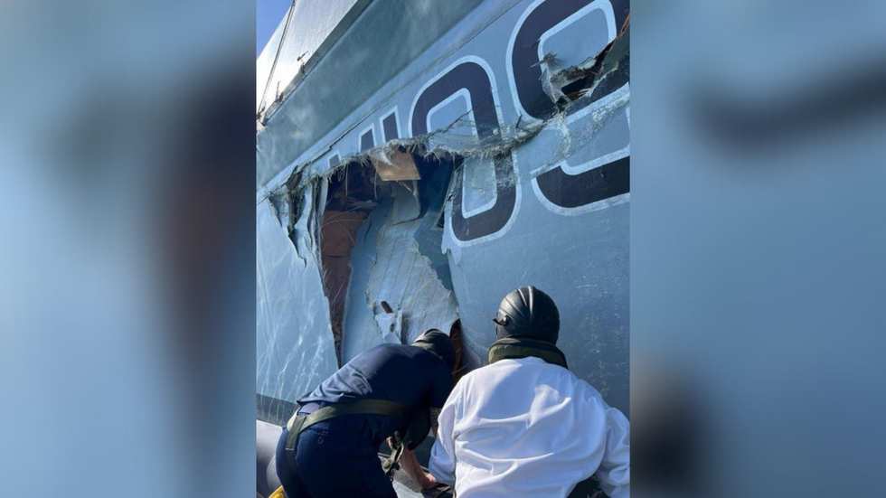 Images of damage on the ship's port side