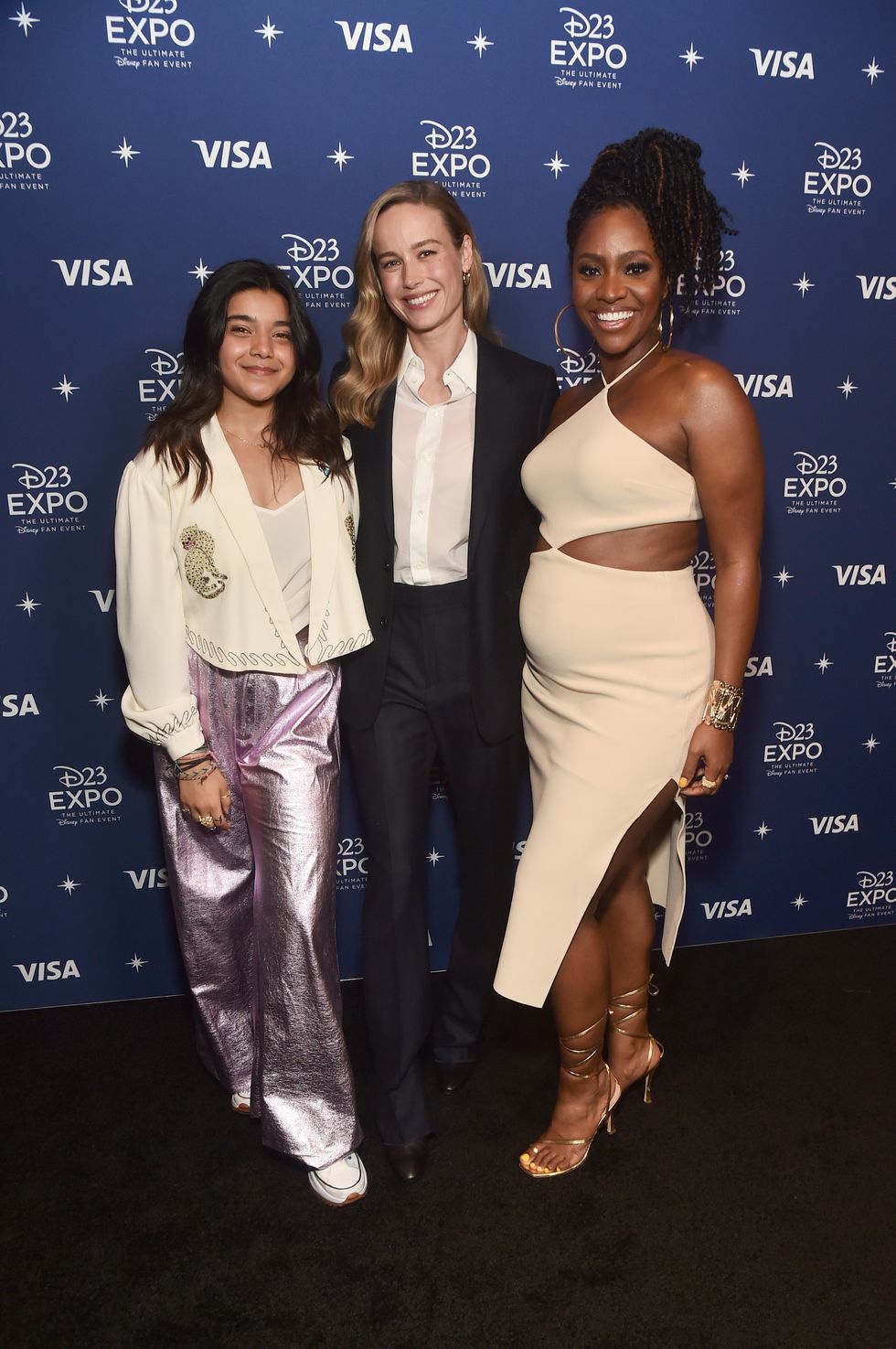 Iman Vellani, Brie Larson, and Teyonah Parris attend D23 Expo 2022