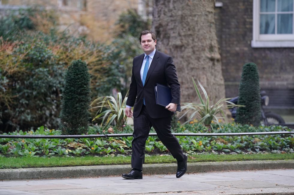 Immigration Minister Robert Jenrick walking up to Number, 10 Downing Street