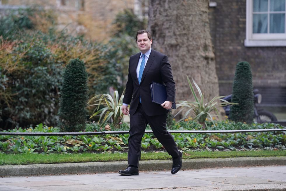 Immigration Minister Robert Jenrick walking up to Number, 10 Downing Street