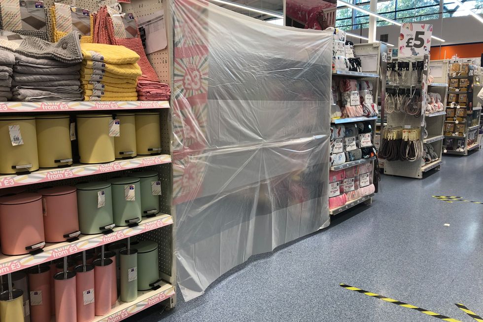 In October 2020 shopping aisles were cordoned off with plastic sheeting in Wales as the country entered a two-week %22firebreak%22 lockdown