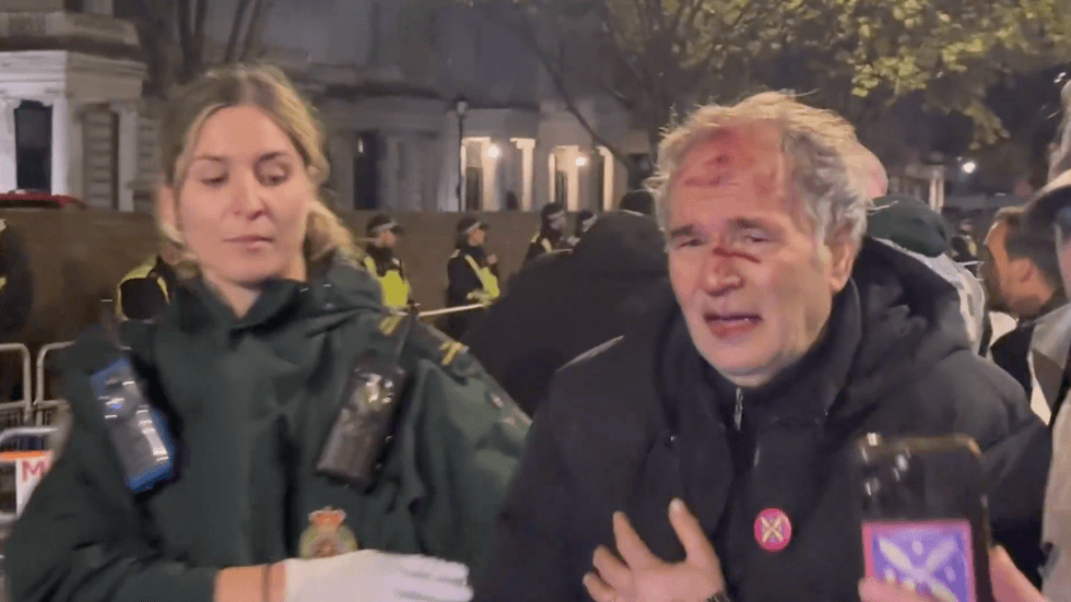 Injured protester outside the Iran embassy in London