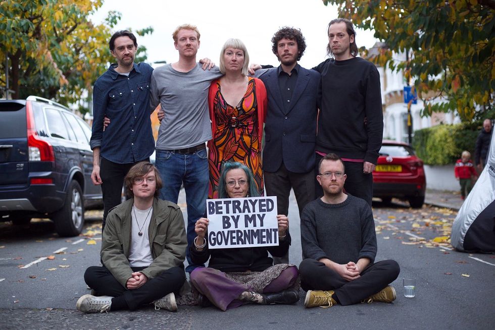 Insulate Britain of their activists (back row left to right) Tim Speers, Roman Paluch, Emma Smart, Ben Taylor, James Thomas, (front row left to right) Louis McKechnie, Ana Heyatawin and Oliver Roc, who along with Dr Ben Buse have been jailed at the High Court for breaching an injunction designed to prevent the groups road blockades.