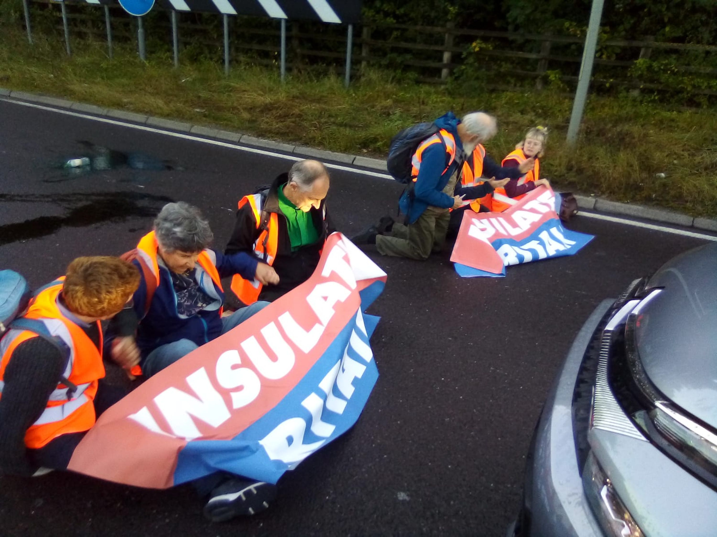 Insulate Britain protesters occupied part of Junction 3 of the M25, stopping cars from passing.