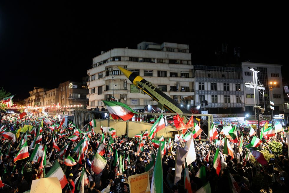 Iran showcased its ballistic weapons at a parade in Tehran on Tuesday evening